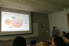 Yurii is-giving a talk